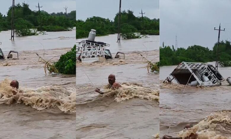 Rajulaના કોઝવે પર દૂધના કેન ભરેલી ગાડી તણાઈ, દોરડાની મદદથી ડ્રાઈવરનો ચમત્કારિક બચાવ 1 thenewsdk.in